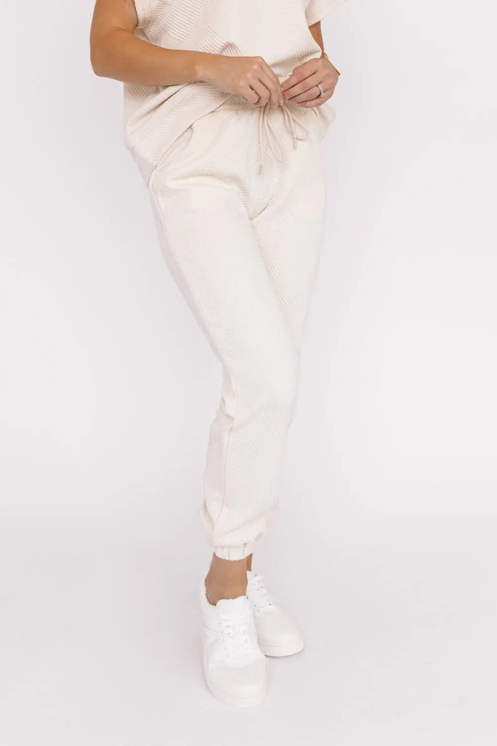 Weekend Vibe Cream Textured Joggers: Your Passport to Elevated